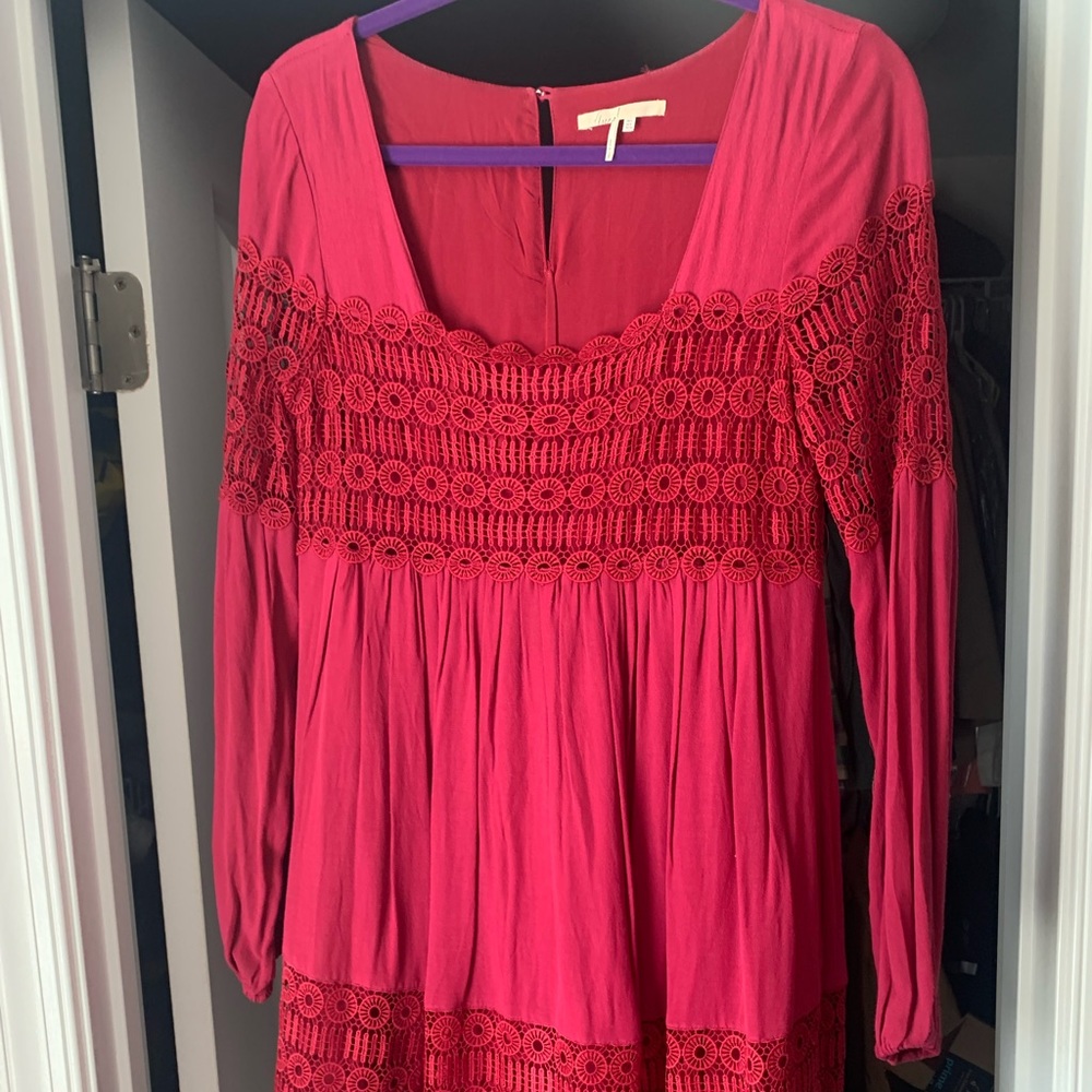 Deep red lace long-sleeved dress.